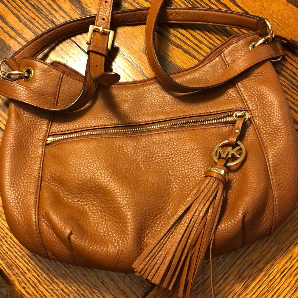 Brown Michael Kors purse.
